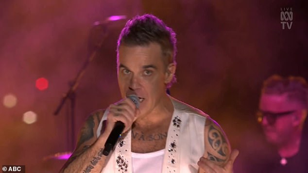 Robbie's stellar performance was marred by an awkward exchange with an audience member during the song Land of 1000 Dances.