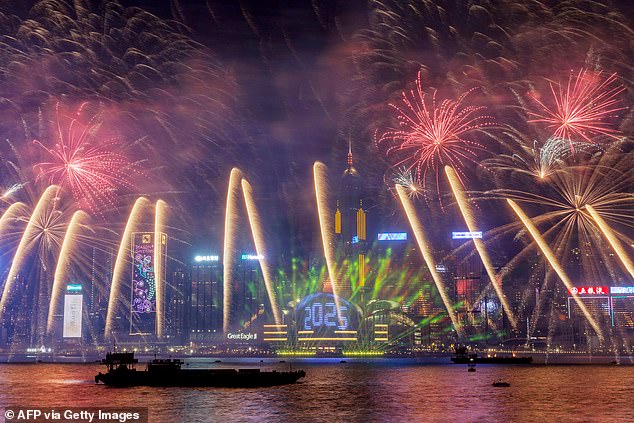 HONG KONG: Fireworks light up the midnight sky over Victoria Harbor during New Year 2025 celebrations in Hong Kong on January 1, 2025