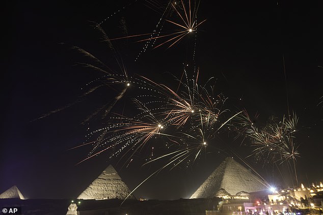 EGYPT: Fireworks spark over the historic site of the Pyramids of Giza, just outside Cairo