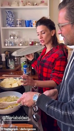 A video obtained by DailyMail.com shows Hilaria treating her holiday guests to a Spanish omelette 