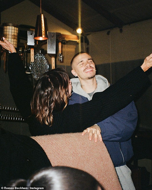 Romeo also shared a sweet photo of him dancing with fashion mogul mom Victoria, who threw her arms in the air with joy.