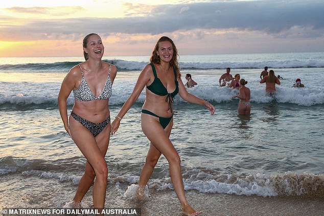 Some visitors to Bondi took the opportunity to freshen up with a morning swim.