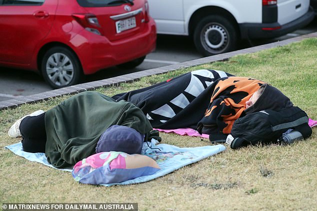 Partygoers were seen getting some sleep before the spectacular sunrise.