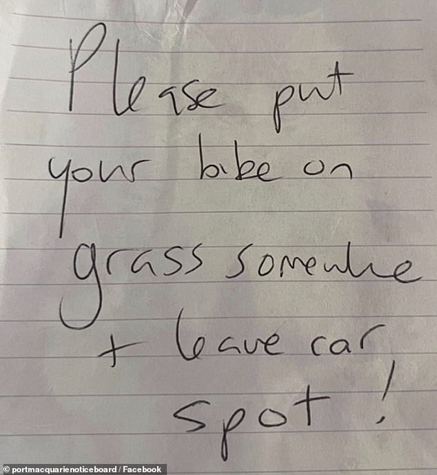 A short handwritten note was left on Diane Lawrence's two-wheeled transport during a morning visit to Shelly Beach in Port Macquarie on the central New South Wales north coast.