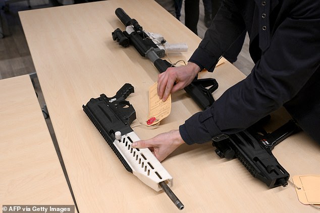 3D-printable FCG-9 semi-automatic pistol-caliber carbines are presented to journalists by the Marseille prosecutor before a press conference last year