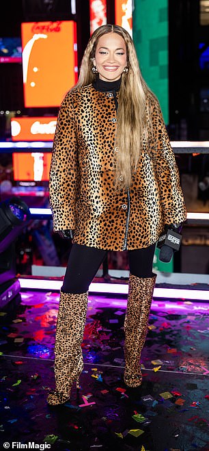 In another look, she donned a leopard-print jacket with matching knee-high boots.