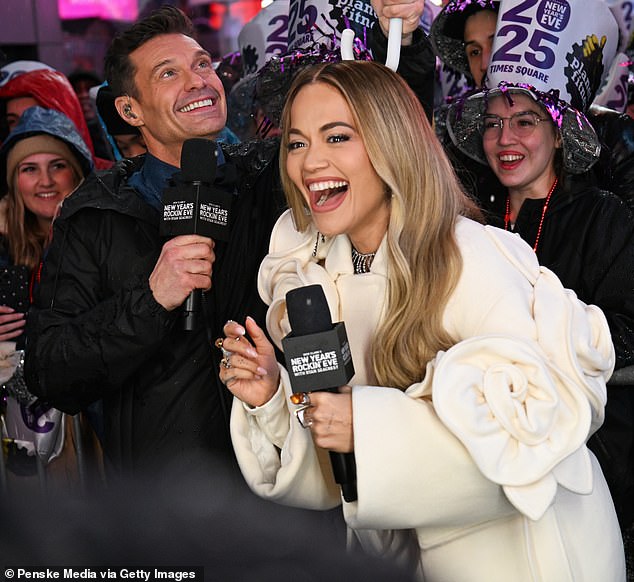 She also joined Seacrest at one point and the pair flashed cheerful smiles as they carried on a light-hearted conversation.