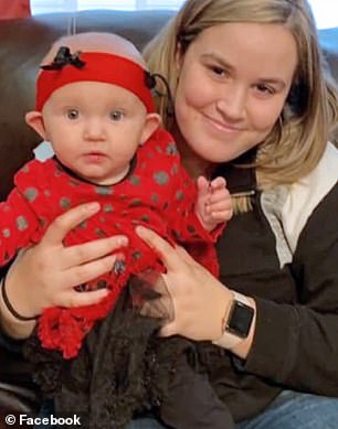 Addison, pictured left with her older half-sister