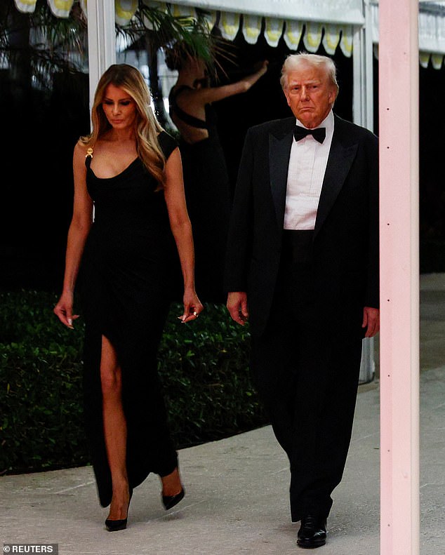 Melania flaunted her slender pins thanks to the thigh-high slit of the Versace dress and paired it with a pair of black heels