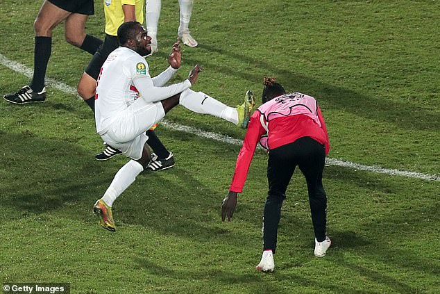 Zamalek's Kabongo Kasongo aims a kick at Al Ahly's Aliou Badji during a Cairo derby in 2020