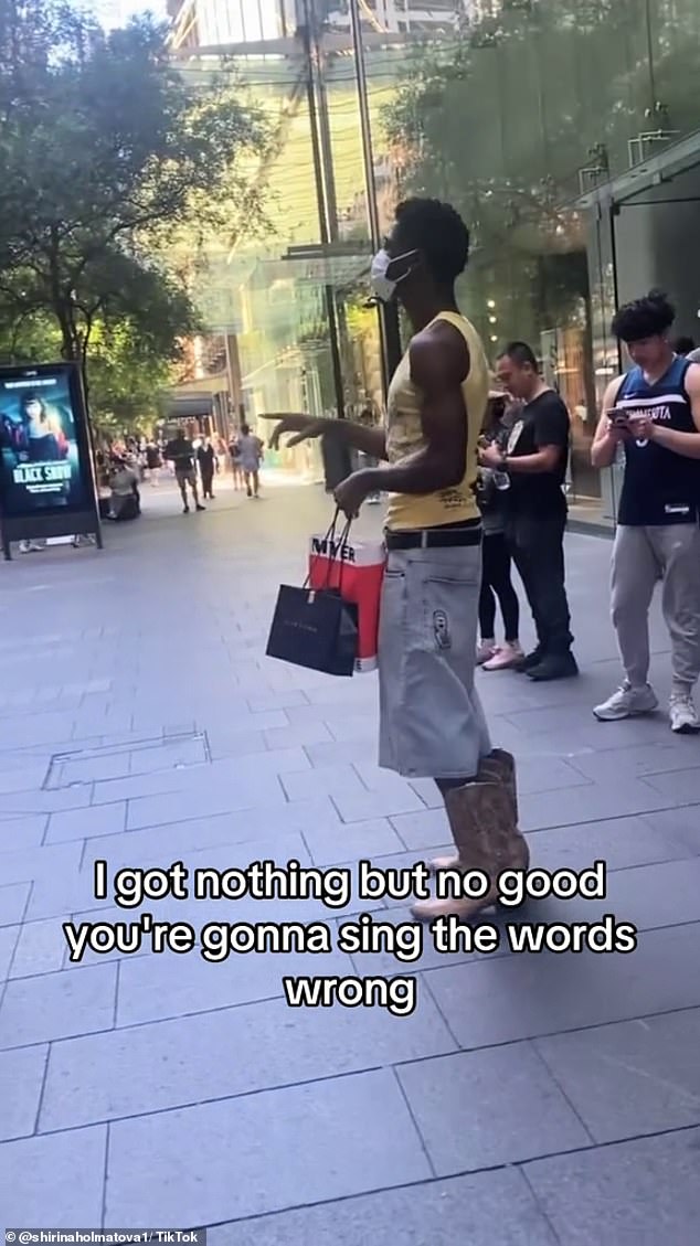 Singer Shirina Holmatova took to social media this week to reveal that while busking at Sydney's Pitt Street Mall she was unknowingly performing for rapper Lil Nas X (pictured).