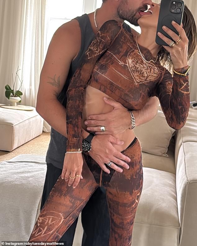 On the night, Ruby showed off her incredible braless figure underneath a daring sheer ensemble as she packed on the PDA with her fiancé Shannan Dodd.