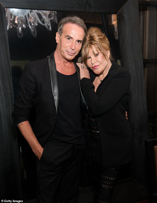 Lloyd Klein and Jocelyn pose for a photo at the Baccarat Hotel in 2017