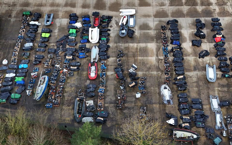 Some of the boats and outboard motors seized from people smuggling gangs whose vessels were intercepted in the English Channel are stored in Dover.