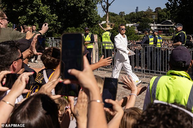 Robbie arrived at Fed Square to a horde of screaming fans