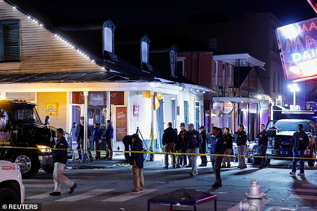 FBI agents walk near the site where people were killed by a man driving a truck during an attack during New Year's celebrations, in New Orleans, Louisiana, U.S., January 1, 2025