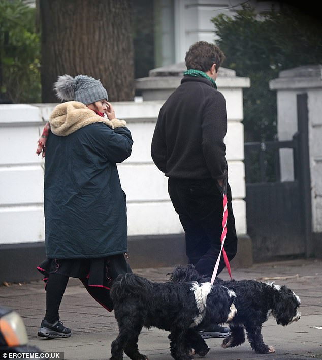 The couple took a walk through north London with their two dogs.