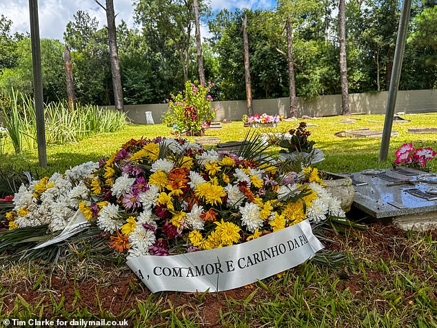 Photo shows the graves of Tatiana Denize Silva dos Santos, 43 and Neuza Denise Silva dos Anjos, 65 at Sao Vincente Cemetery in Porto Alegre, Brazil