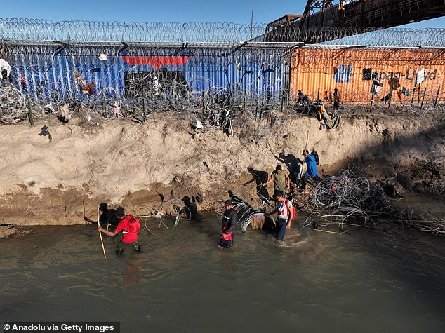 He said, “Trump is not wrong when we talk about the fact that border crossings were quite low,” before pointing to more failures by the outgoing president. Pictured is an immigrant group trying to cross the Texas border at Eagle Pass in February