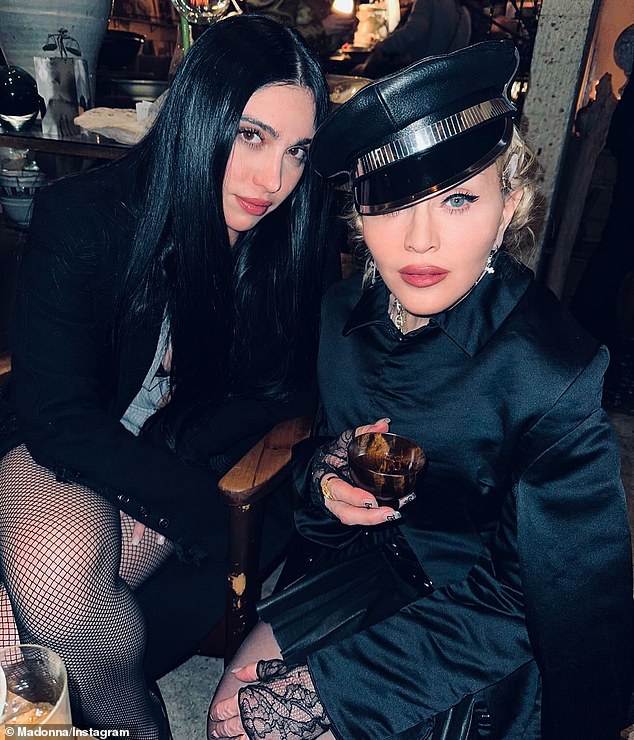 She posed with her daughter Lourdes, whom she shares with her ex-partner, actor Carlos León, while modeling a black satin minidress as an elegant hat.