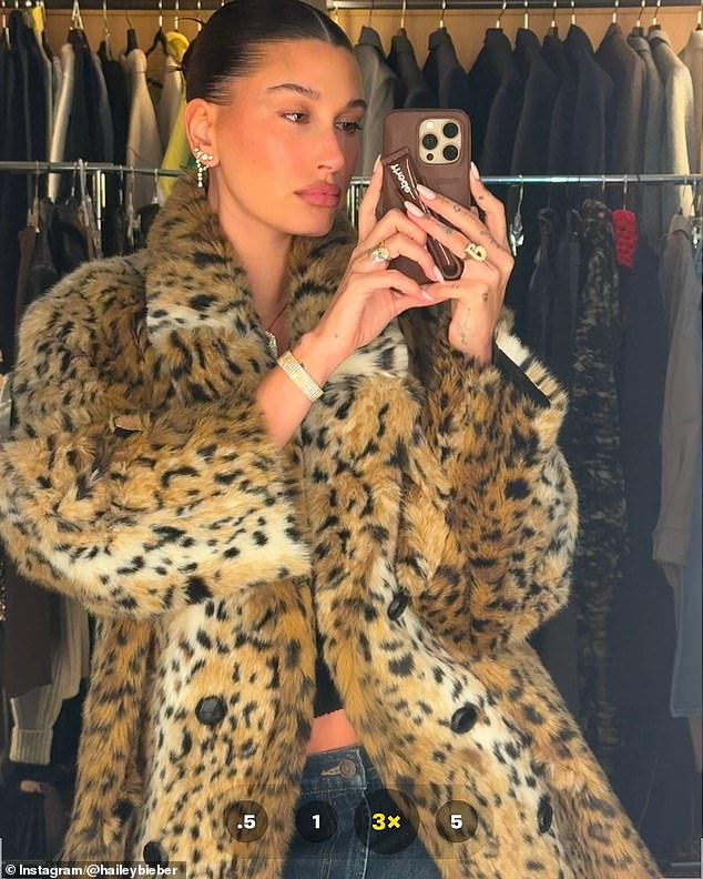 Hailey rocked her leopard-print faux fur jacket with jeans and a black T-shirt for part of the New Year's Eve festivities.