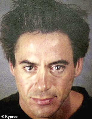 Shown here is Robert Downey Jr's mug shot from 2000, shortly after being jailed for drug possession.