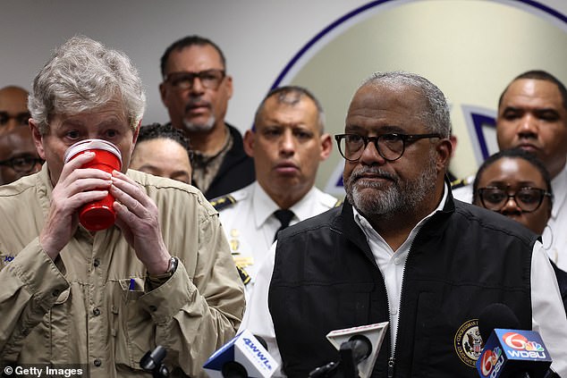 While this was happening, Kennedy continued to offer his update, looking somewhat disheveled as he insulated his plastic cups with paper towels. He vowed to pursue the FBI like 'they stole Christmas' to find out the 'truth', while his joke sparked some backlash online