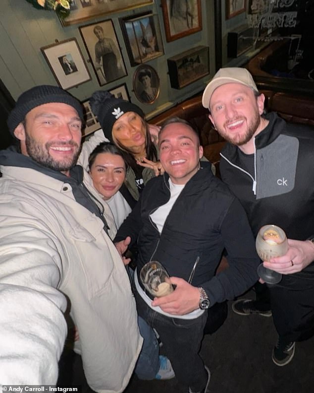 Celebrity makeup artist Lou, 41, was also seen posing for a selfie with the athlete and his friends in a pub.