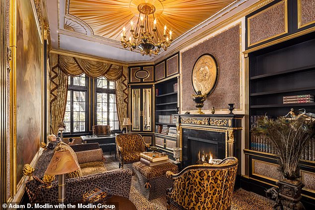 The house also features a library, which Ivana used as an office, decorated with leopard-print furniture and a gold fireplace.