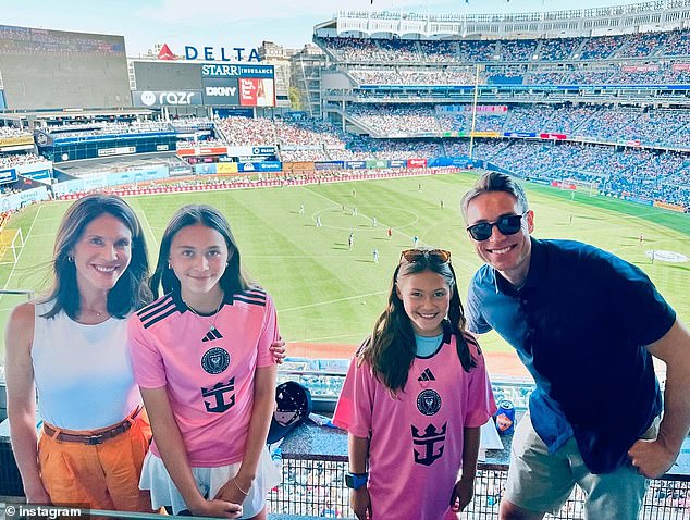 Whit pictured with his wife Andrea Fujii and their daughters Leah, 12, and Summer, 10, in September 2024