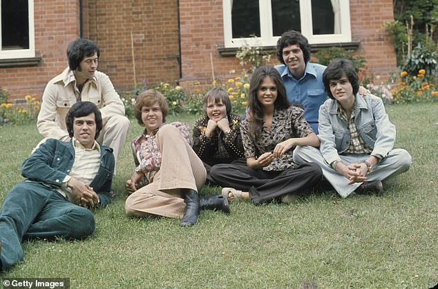 The Osmonds seen here; Left to right, Wayne, Jay, Merrill, Jimmy, Marie, Alan and Donny during a visit to the UK circa 1974 in England.