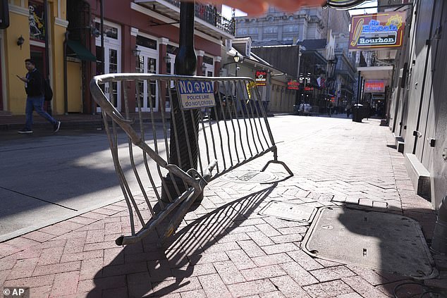 The barricade where a truck ran over and plowed into a crowd on New Year's Day stands aside on Bourbon Street, Thursday, Jan. 2, 2025, in New Orleans.