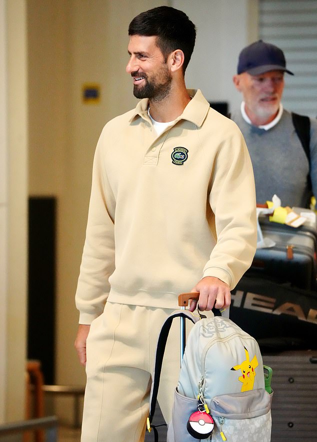 Djokovic, 37, was recently spotted by an eagle-eyed fan carrying a gray Pikachu backpack (pictured) as he walked to Brisbane airport.