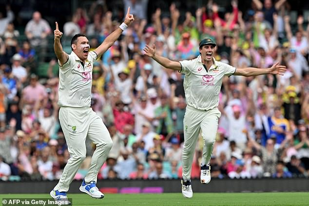 Had the dismissal been upheld, Scott Boland (pictured left appealing for the wicket with Pat Cummins) would have received two scalps in two balls.