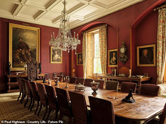 The large rooms feature impressive ceilings and paintings.