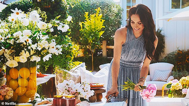 The trailer shows Meghan performing the usual cooking show clichés: chopping onions, growing a raspberry and harvesting honey from her own hives.