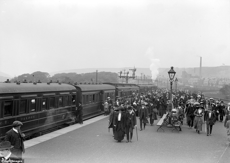 Crowds of tourists arrive at Scarborough railway station in this image, taken in 1913. The Scarborough Civic Society states: 