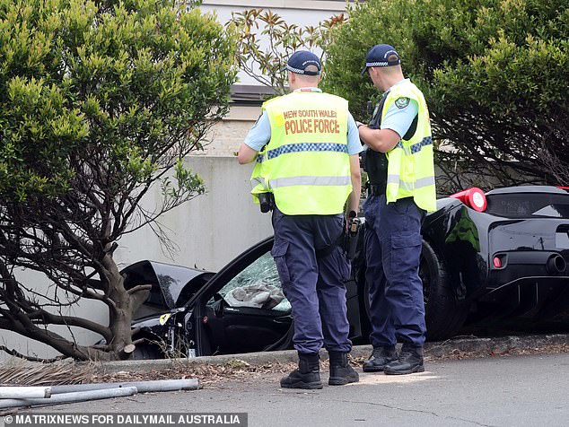 The luxury vehicle (pictured) crashed through a brick fence before crashing into a wall on Robertson Place in Watsons Bay, in Sydney's eastern suburbs, on Thursday afternoon.