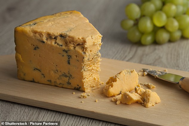 While Stilton remains a popular choice, Shropshire Blue has been rapidly gaining ground, with cheese lovers going crazy for its rich yolk-colored interior and flaky beige rind (file photo).