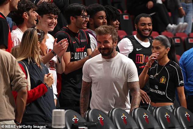 Former England player David, who is now co-owner of Inter Miami football club, looked in high spirits as he was greeted with cheers as he walked onto the pitch.