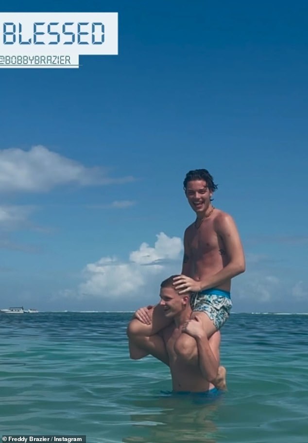 Freddie also shared a sun-kissed photo while joking in the ocean with his brother Bobby on his shoulders.