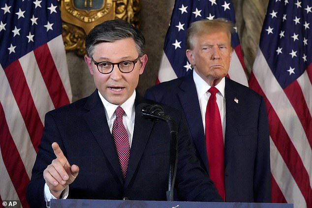 House Speaker Mike Johnson, R-La., speaks as Republican presidential candidate, former President Donald Trump, listens during a news conference on April 12, 2024 at Mar-a-Lago in Palm Beach, Florida.