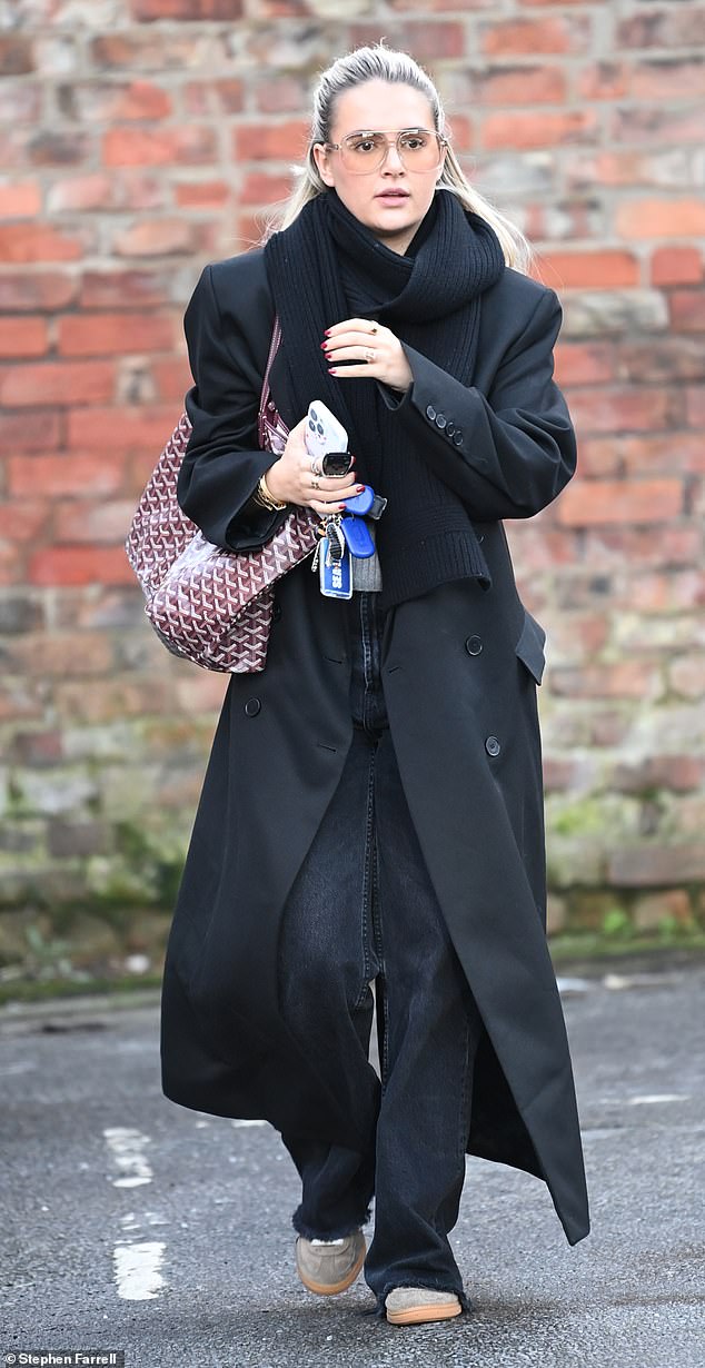 Molly-Mae, who shared custody of her daughter Bambi, 23 months, with the boxer on Christmas Day, looked effortlessly stylish while wrapped in a long black coat and scarf.