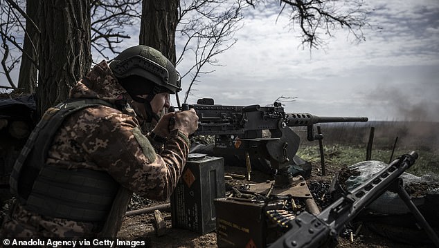 Ukrainian soldiers fire at targets on the front line in the direction of the city of Ugledar, Donetsk.