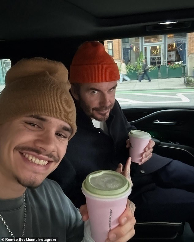 In a second snap, Romeo looked like his famous footballer father David's double as they posed for a selfie in a car while both wearing winter hats and holding drinks.