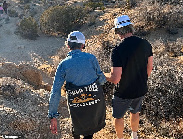 She gave fans a glimpse of the close bond between her husband and mother in a snap in which the Saving Private Ryan star, 56, is seen leading her mother-in-law down a quiet path.