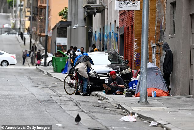 Migration of residents to Republican areas has the power to reshuffle the Electoral College, as votes are distributed based on state population. Pictured: San Francisco's homelessness epidemic