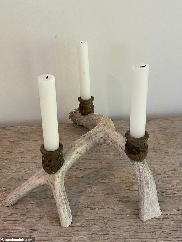 This deer antler candlestick costs $90