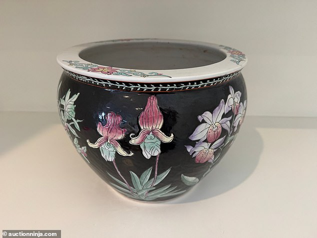 A decorated Asian flower planter costs $2