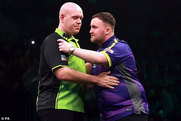 He is the favorite to lift the title tonight when he faces Michael van Gerwen (left)